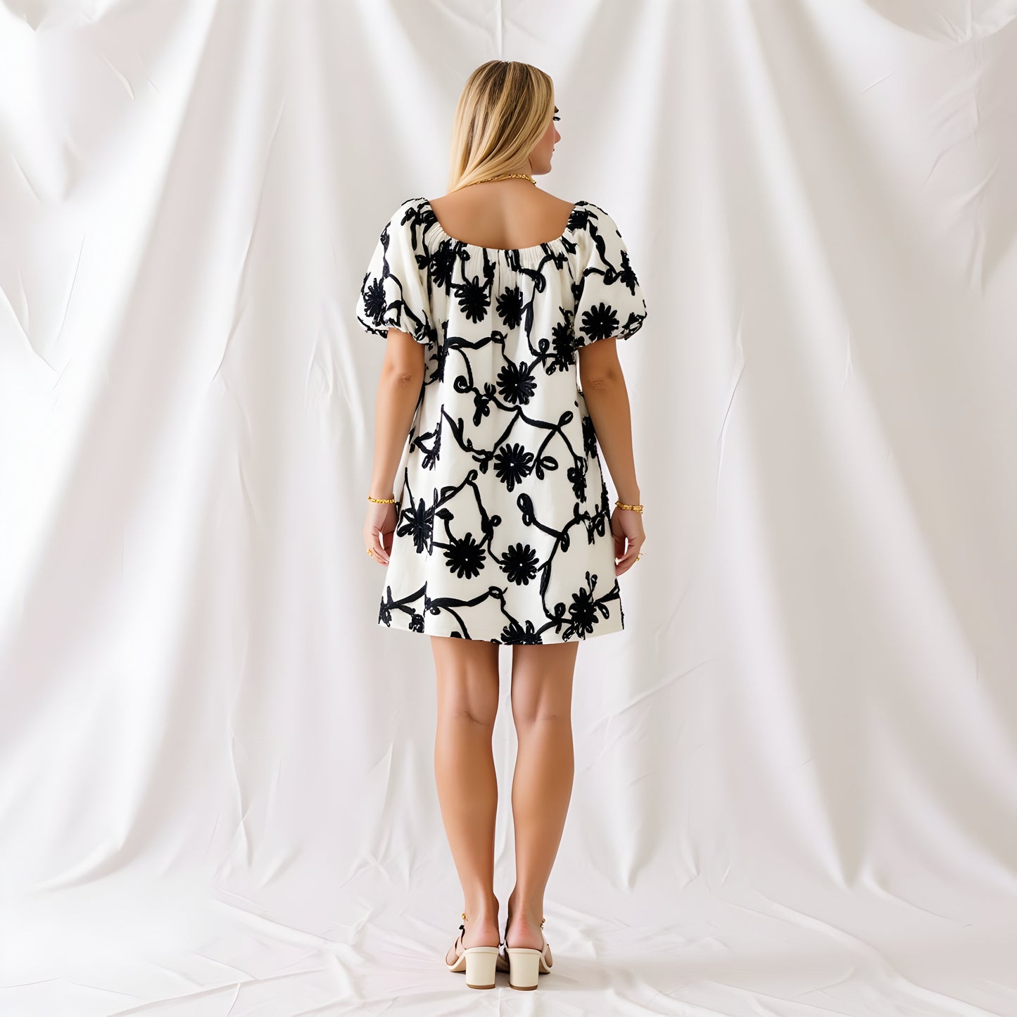 Textured Floral Mini Dress with Puff Sleeves and Tie Neckline