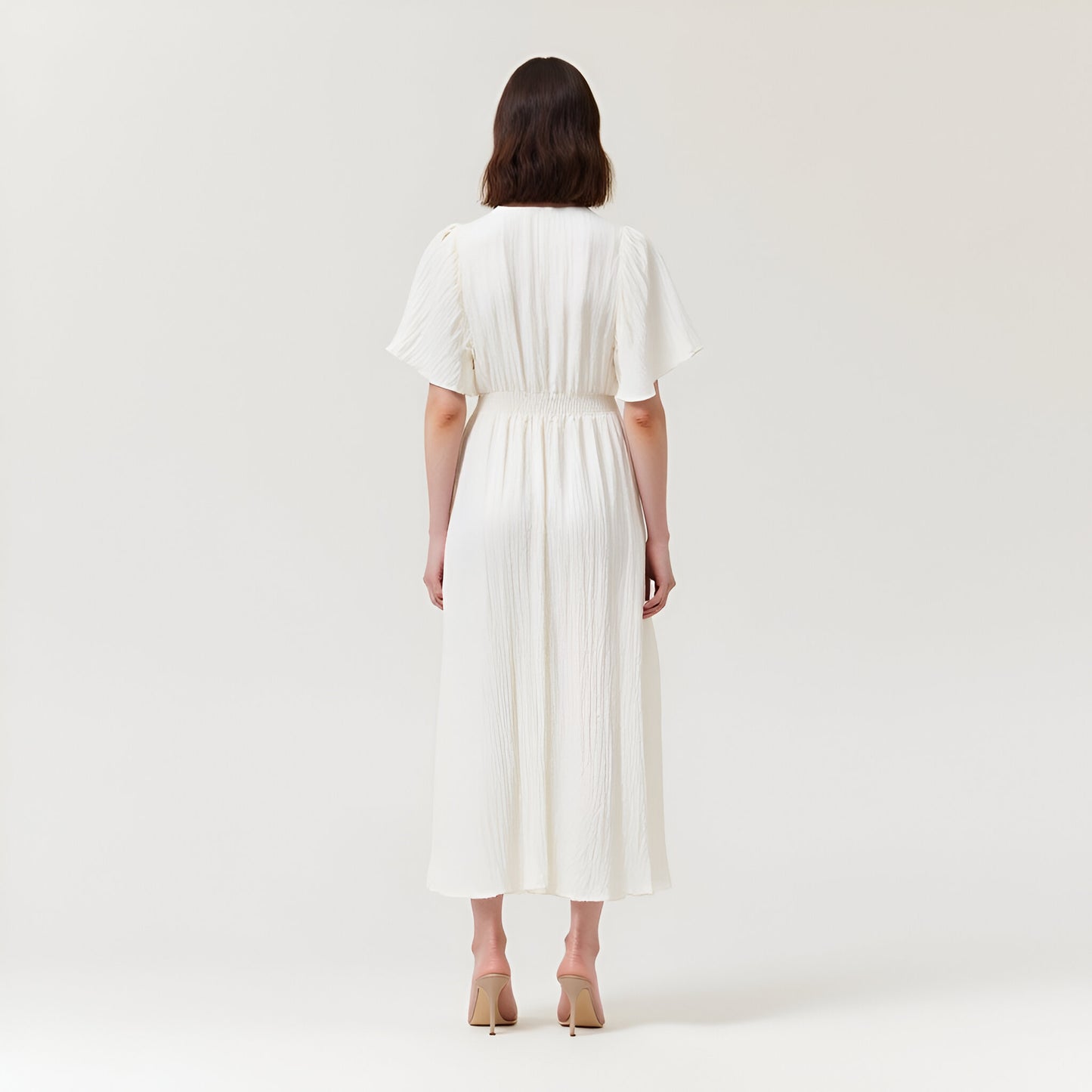 V-Neck Midi Dress with Flutter Sleeves and Handkerchief Hem Detail