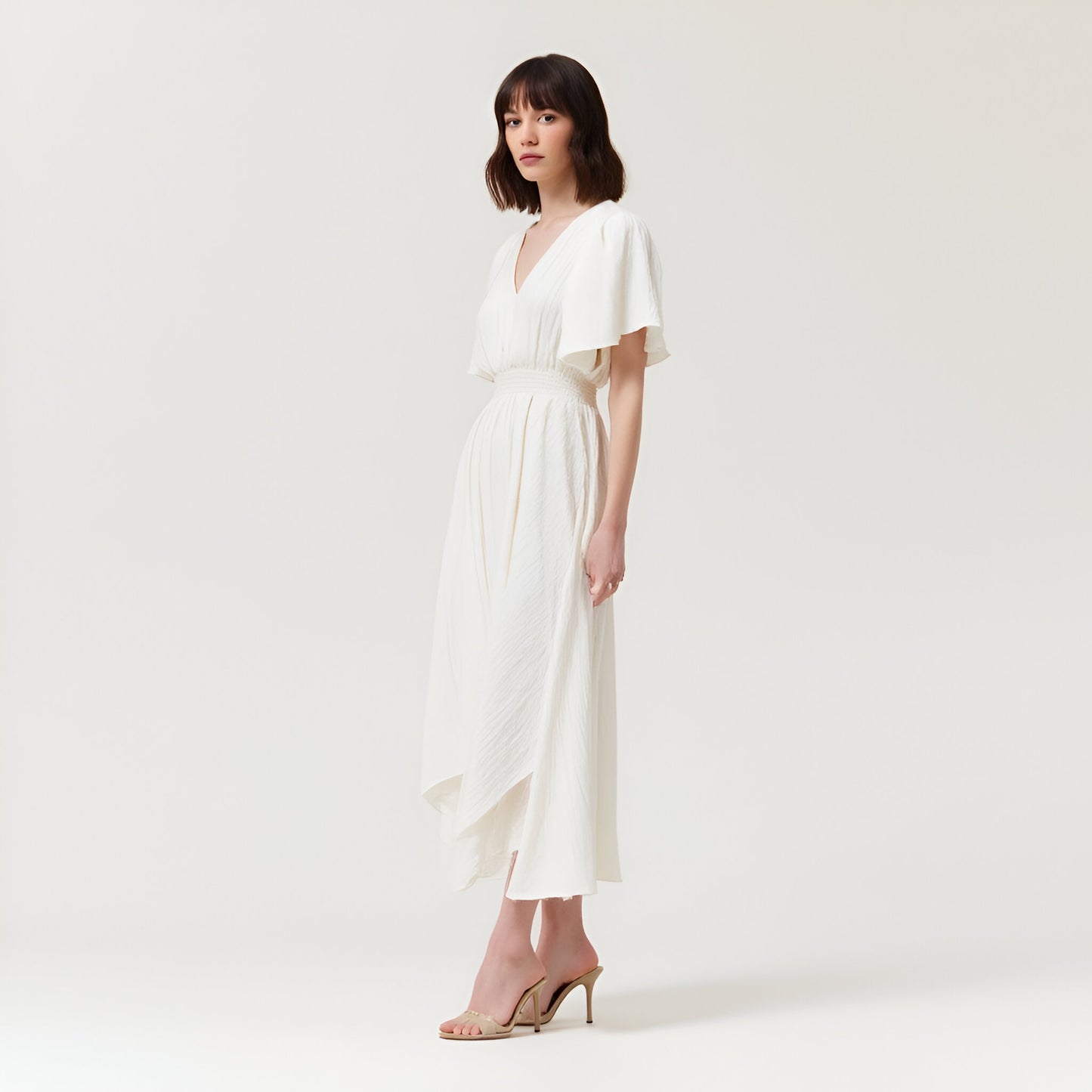V-Neck Midi Dress with Flutter Sleeves and Handkerchief Hem Detail