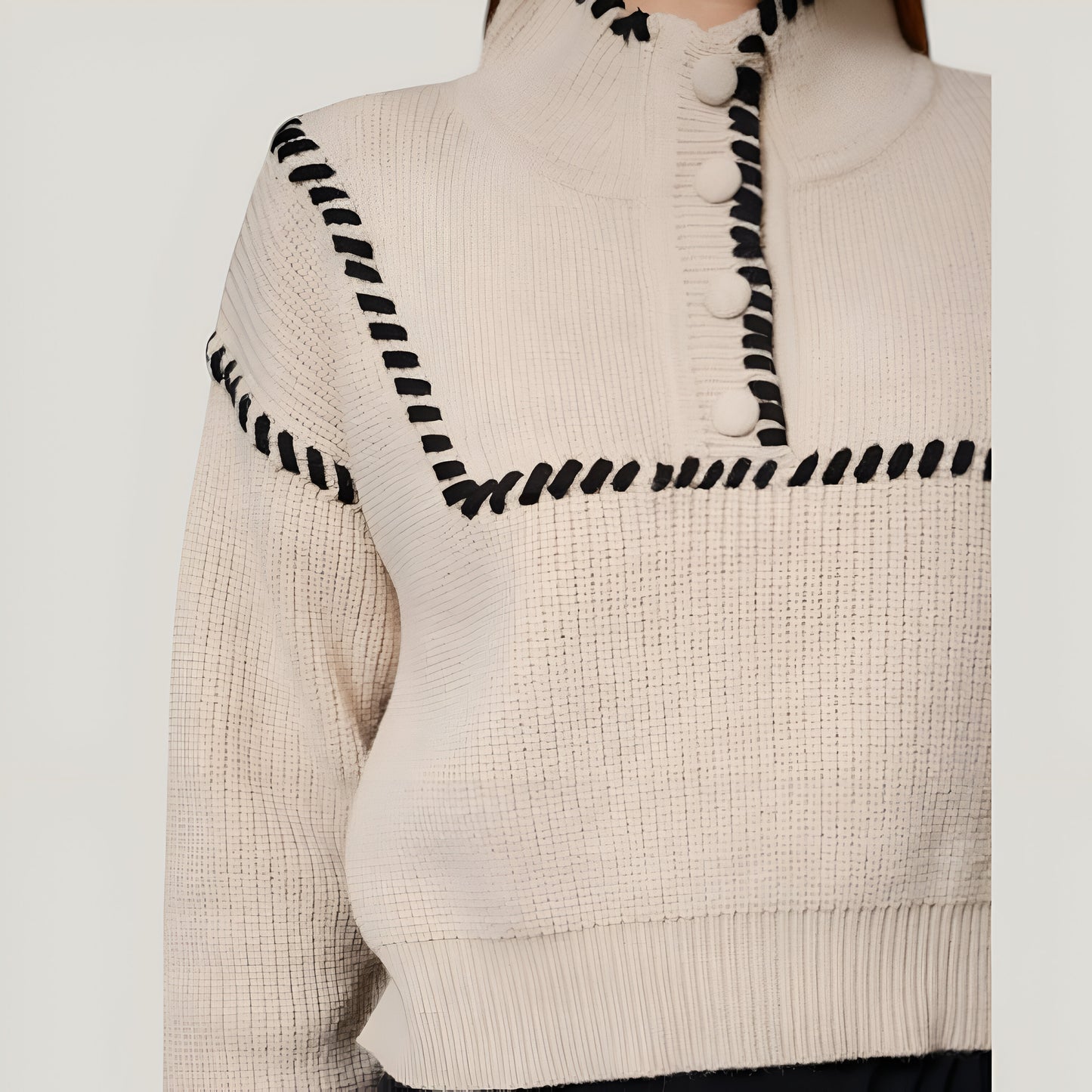 Chunky Knit Cropped Sweater with Ribbed High Neck and Bold Whip Stitch Accents