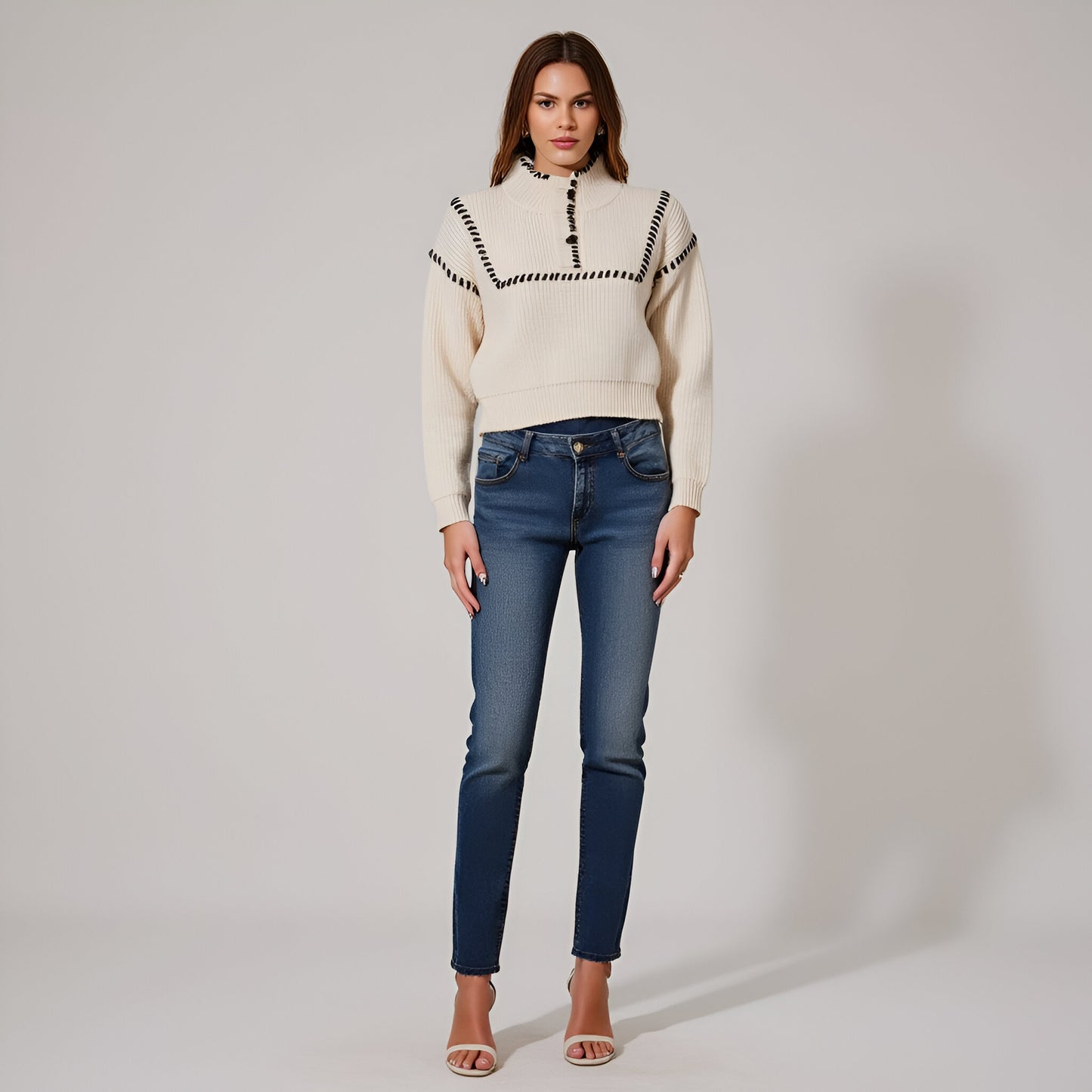 Chunky Knit Cropped Sweater with Ribbed High Neck and Bold Whip Stitch Accents