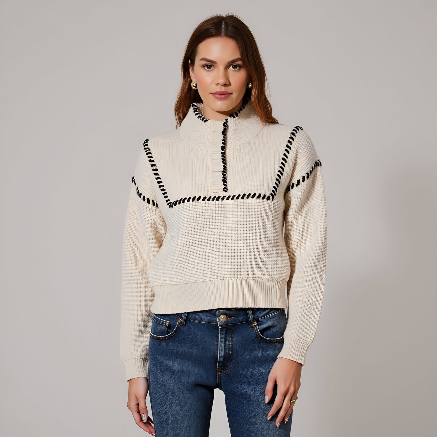 Chunky Knit Cropped Sweater with Ribbed High Neck and Bold Whip Stitch Accents