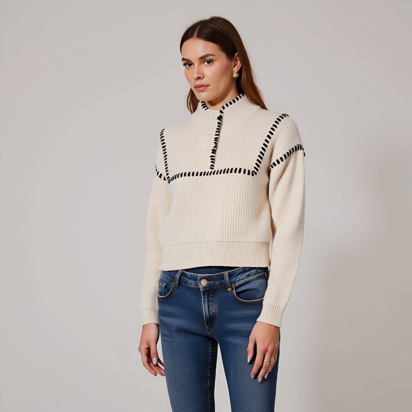 Chunky Knit Cropped Sweater with Ribbed High Neck and Bold Whip Stitch Accents