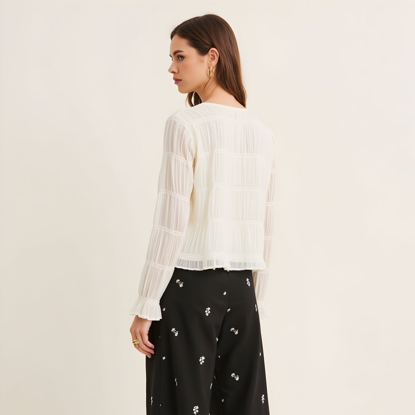 Sheer Textured Long Sleeve Top with Ruffle Trim and Subtle Volume