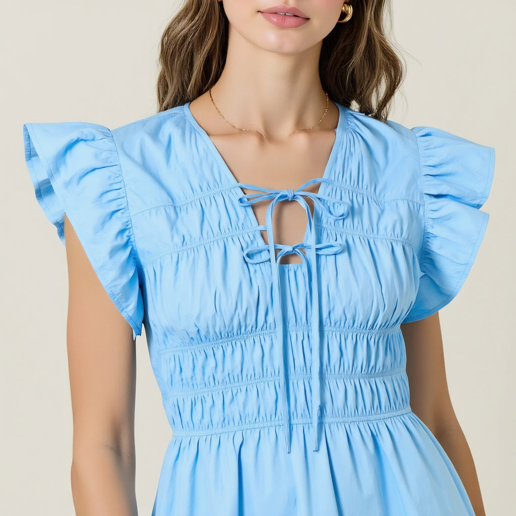 Smocked Mini Dress with Ruffle Sleeves and Front Tie Detail