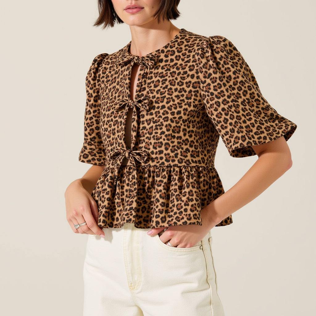 Leopard Print Peplum Top with Front Tie Closures and Short Puff Sleeves