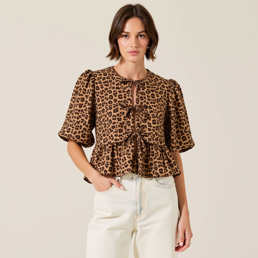 Leopard Print Peplum Top with Front Tie Closures and Short Puff Sleeves