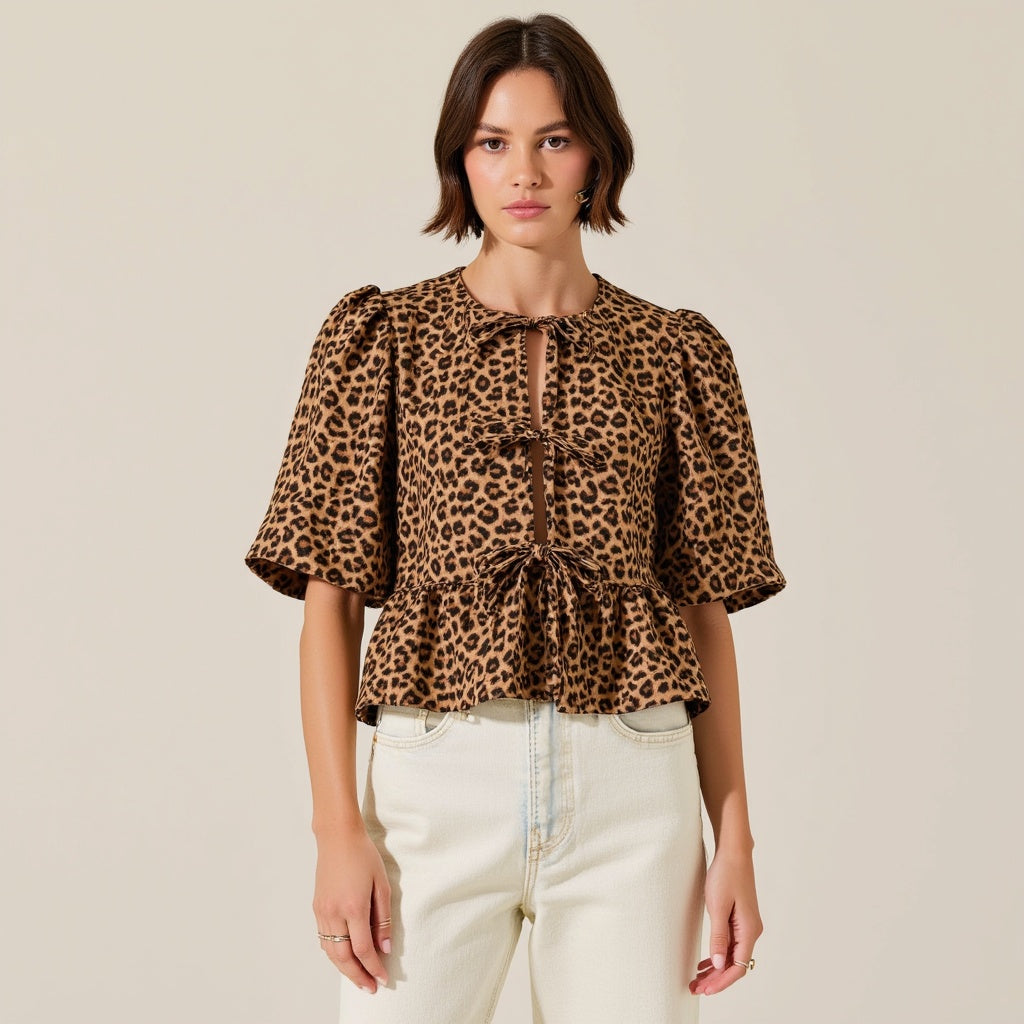 Leopard Print Peplum Top with Front Tie Closures and Short Puff Sleeves