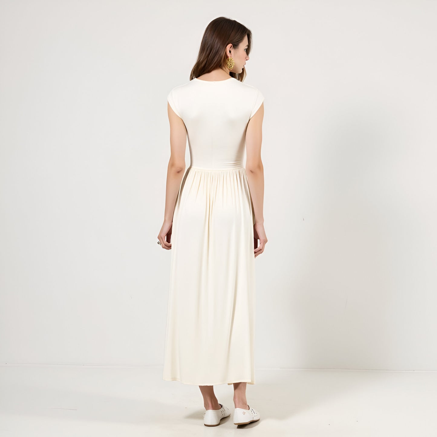 Sleeveless Faux Wrap Maxi Dress with Shirred Waist and Flowy Skirt