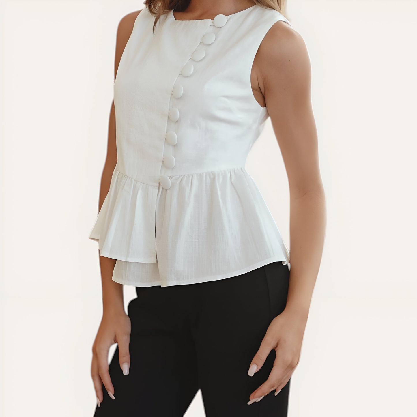 Sleeveless Peplum Top with Asymmetric Pearl Button Front