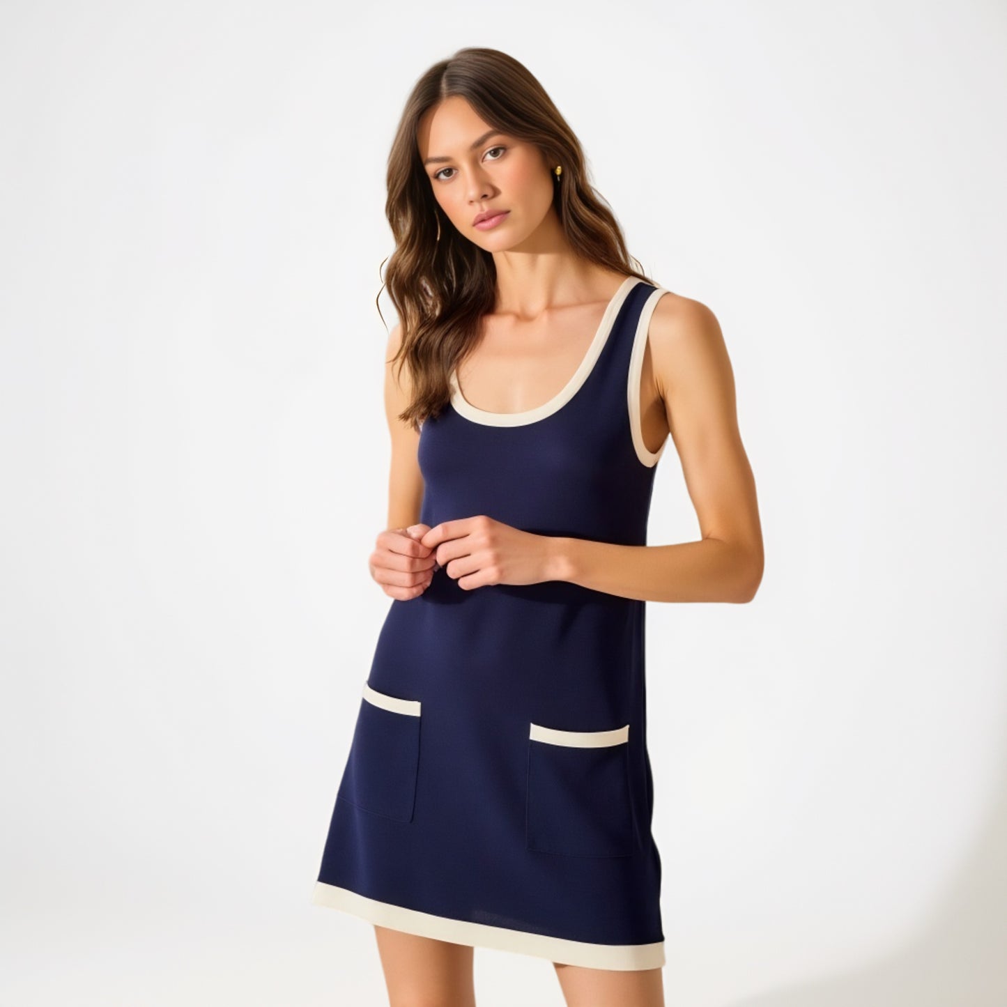 Sleeveless Knit Mini Dress with Contrast Trim and Front Pockets