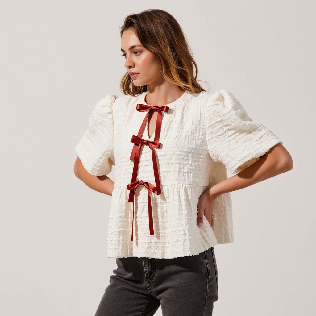 Textured Puff-Sleeve Peplum Blouse with Bow-Tie Front