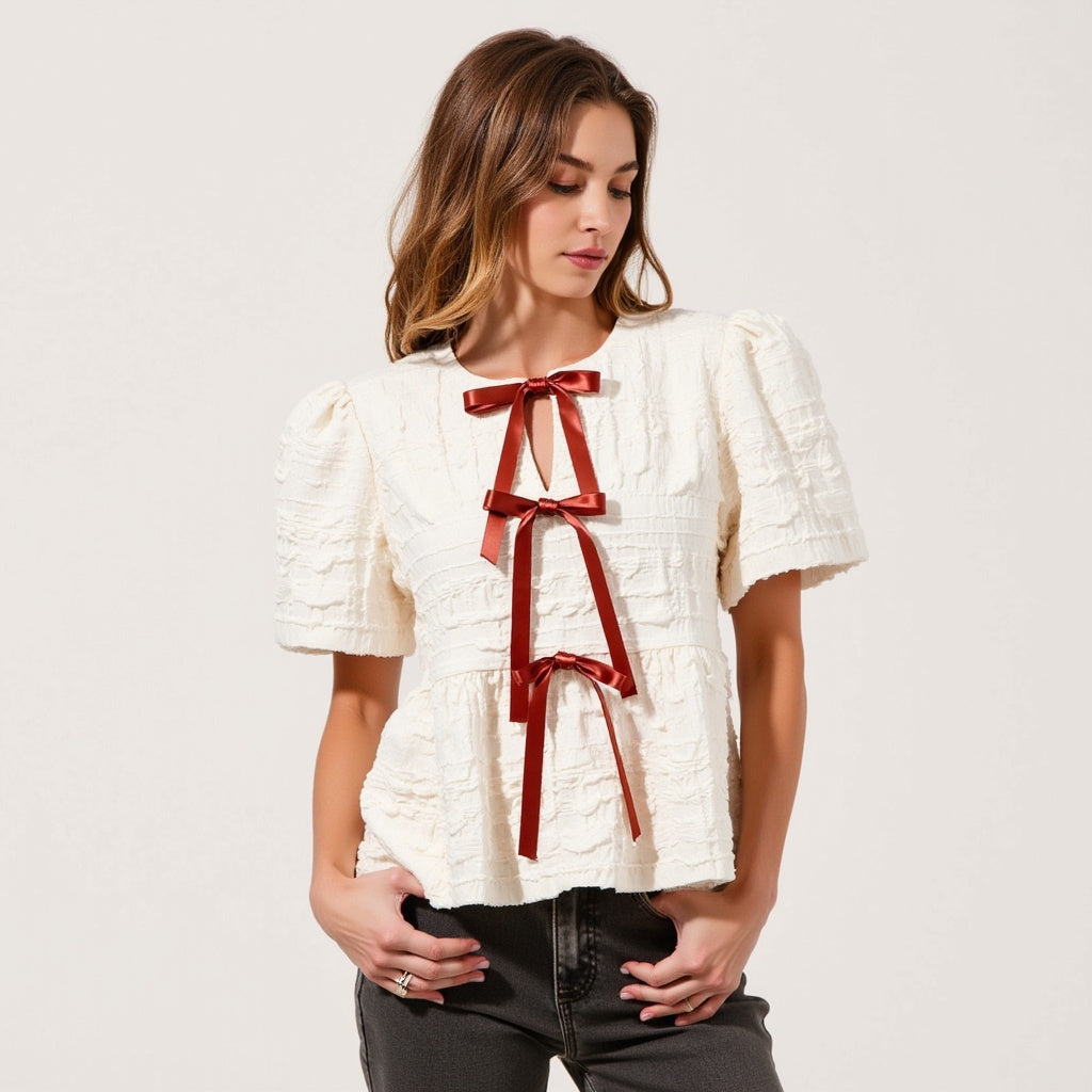 Textured Puff-Sleeve Peplum Blouse with Bow-Tie Front