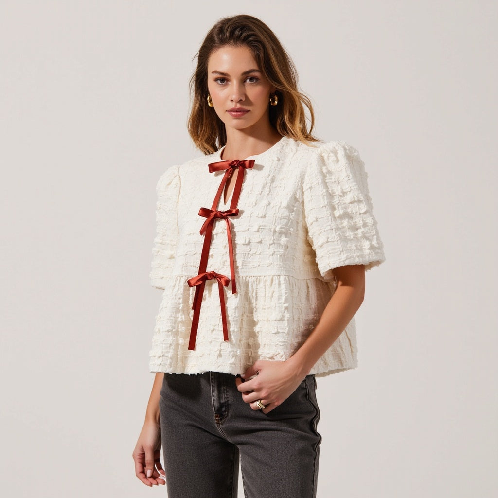 Textured Puff-Sleeve Peplum Blouse with Bow-Tie Front