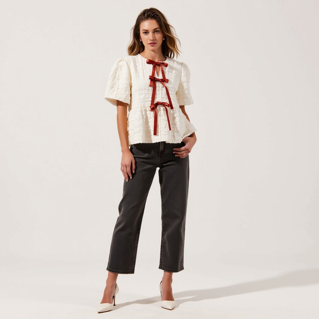 Textured Puff-Sleeve Peplum Blouse with Bow-Tie Front