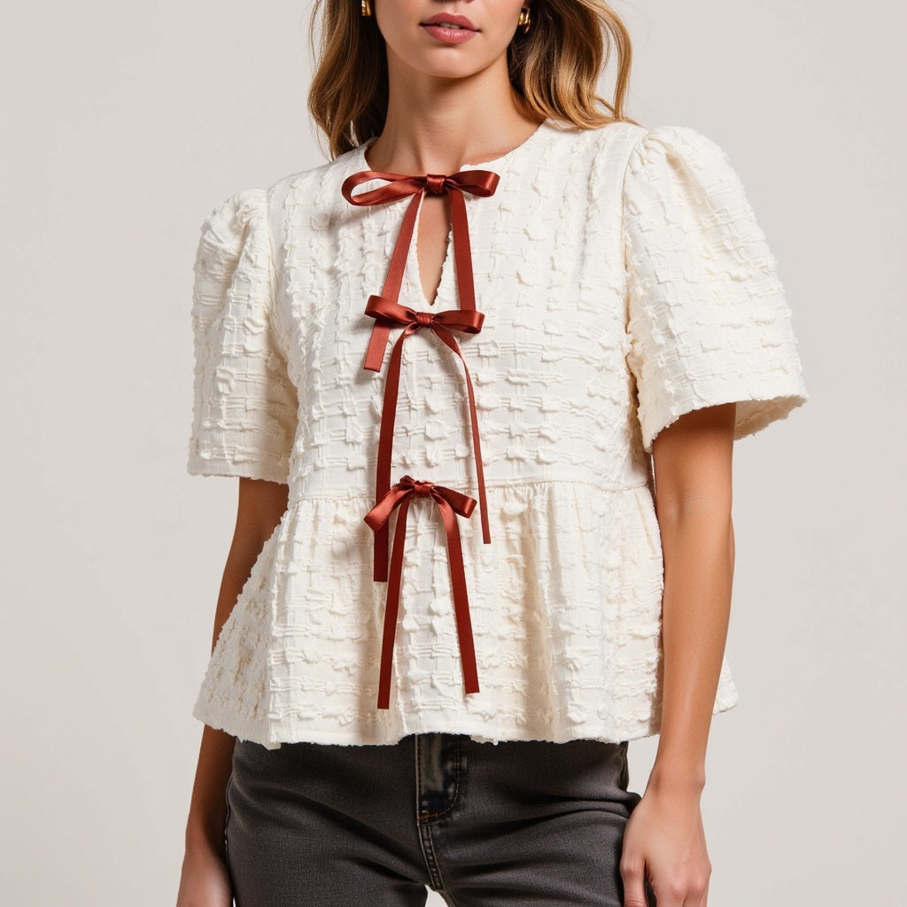 Textured Puff-Sleeve Peplum Blouse with Bow-Tie Front
