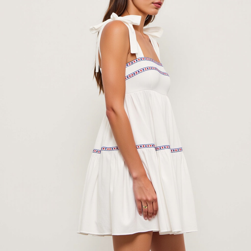 Sleeveless Tiered Mini Dress with Embroidered Trim and Tie Straps