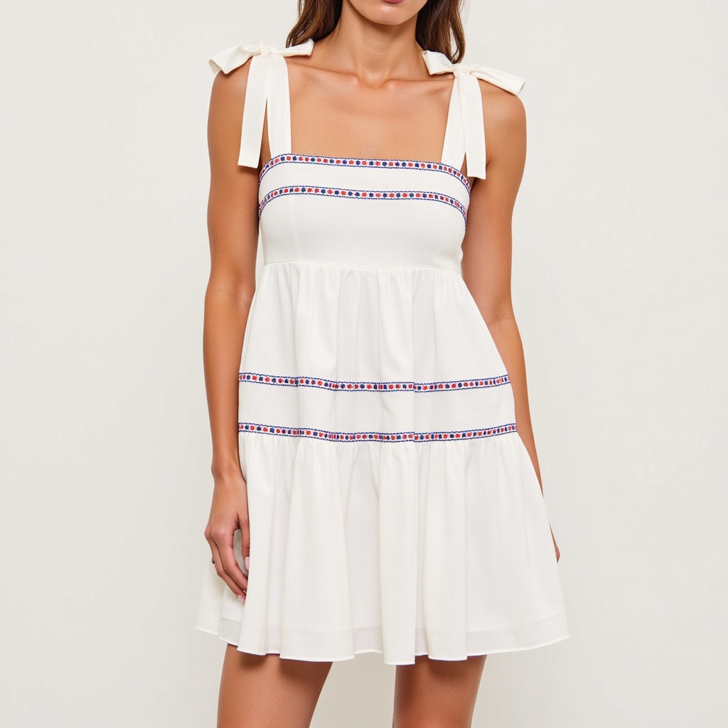 Sleeveless Tiered Mini Dress with Embroidered Trim and Tie Straps