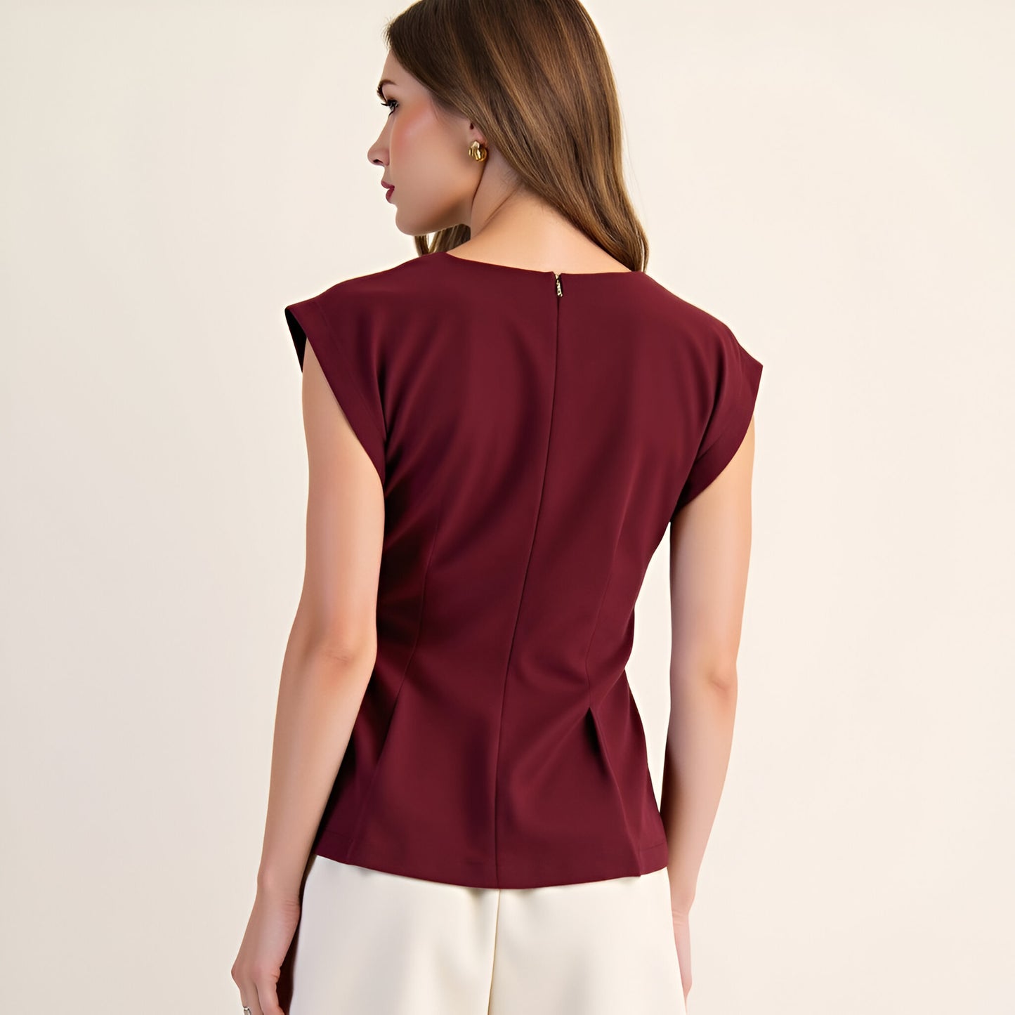 Cap Sleeve Peplum Top with Structured Pleats and Round Neckline