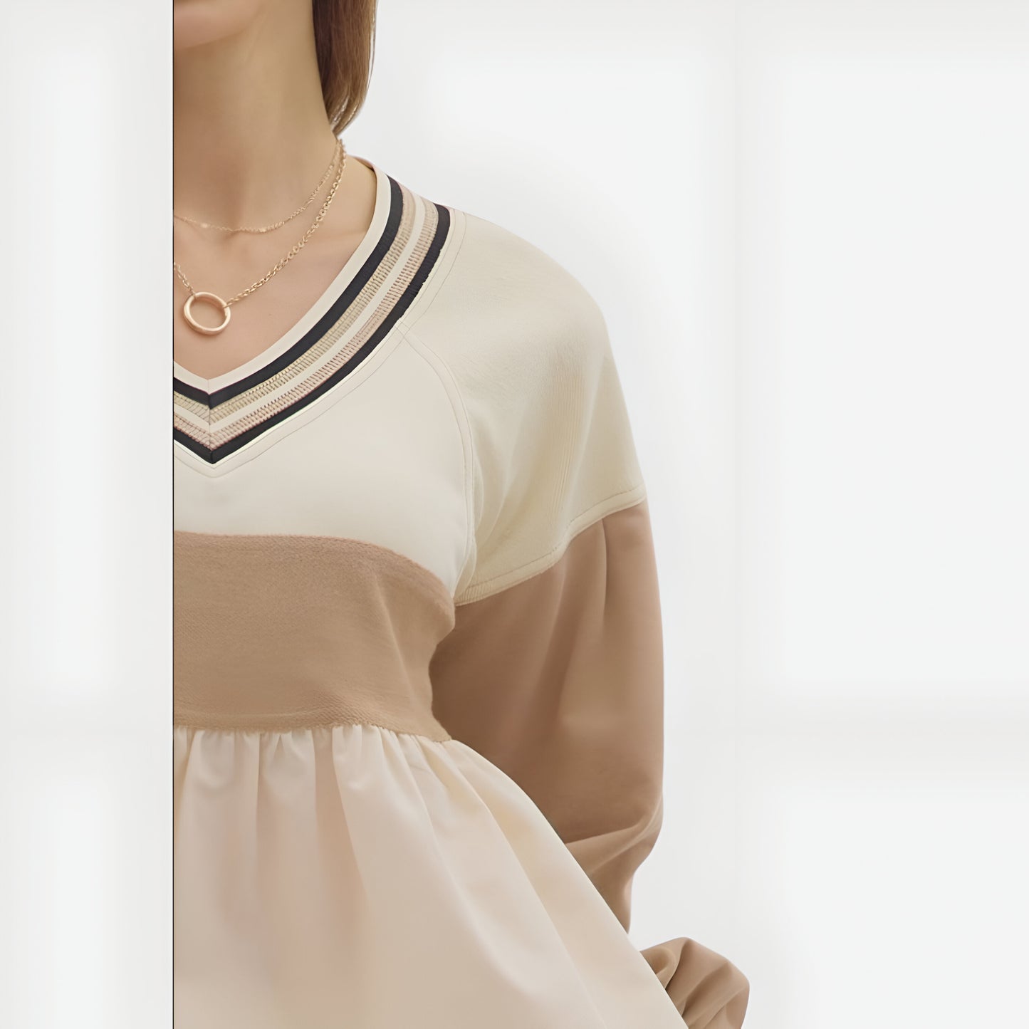 Colorblock V-Neck Peplum Top with Long Sleeves and Stripe Trim