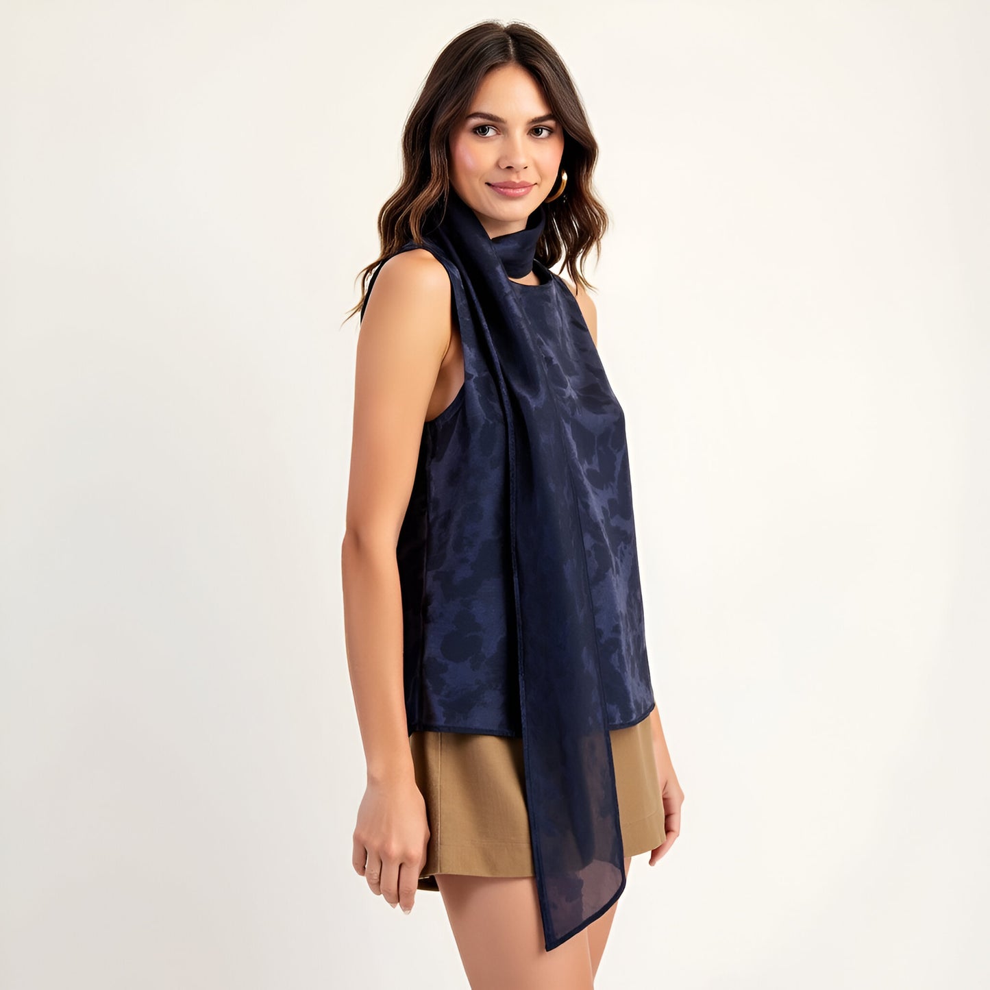 Jacquard Sleeveless Top with Draped Neck Tie and Subtle Floral Texture