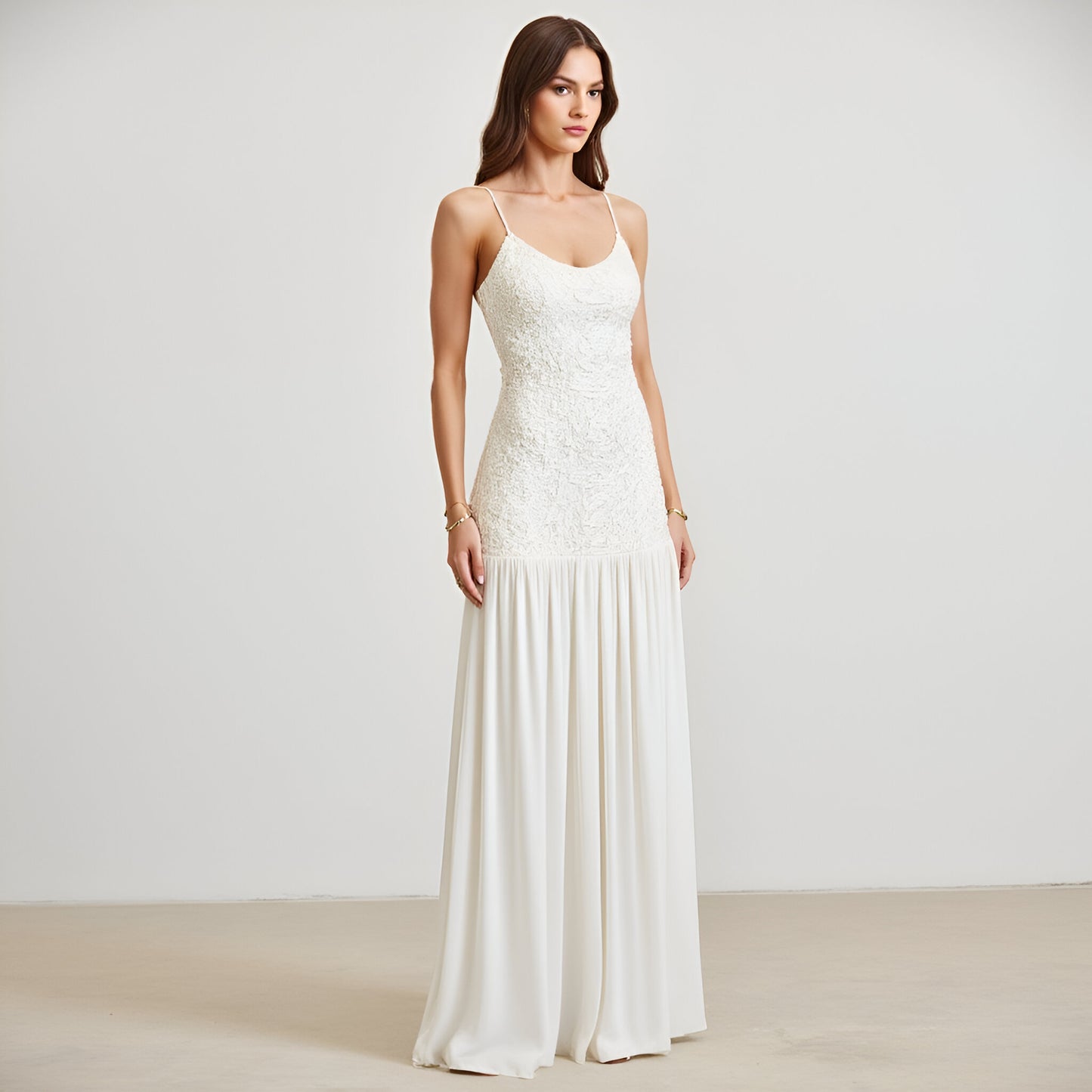 Lace Bodice Gown with Spaghetti Straps and Flowing Pleated Skirt