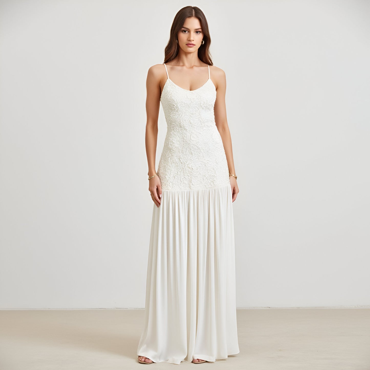 Lace Bodice Gown with Spaghetti Straps and Flowing Pleated Skirt