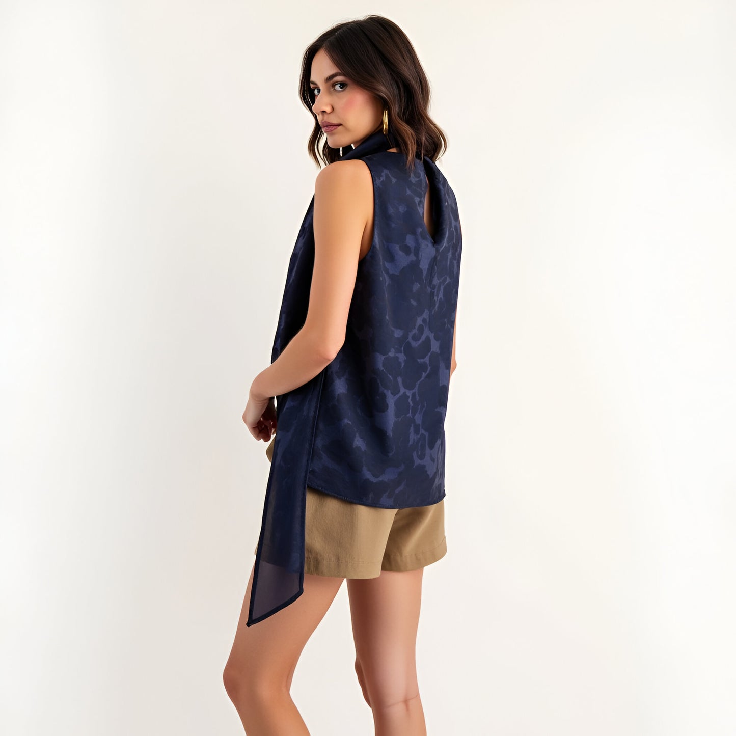 Jacquard Sleeveless Top with Draped Neck Tie and Subtle Floral Texture