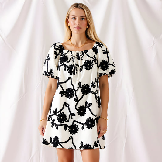 Textured Floral Mini Dress with Puff Sleeves and Tie Neckline