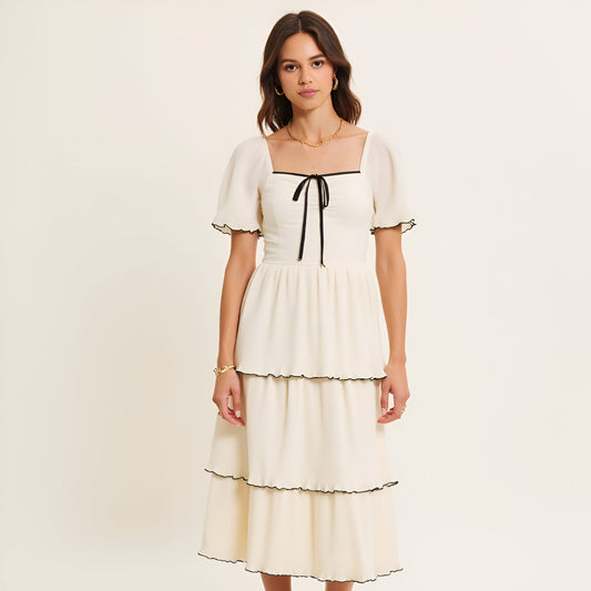 Tiered Pleated Midi Dress with Flutter Sleeves and Contrast Trim