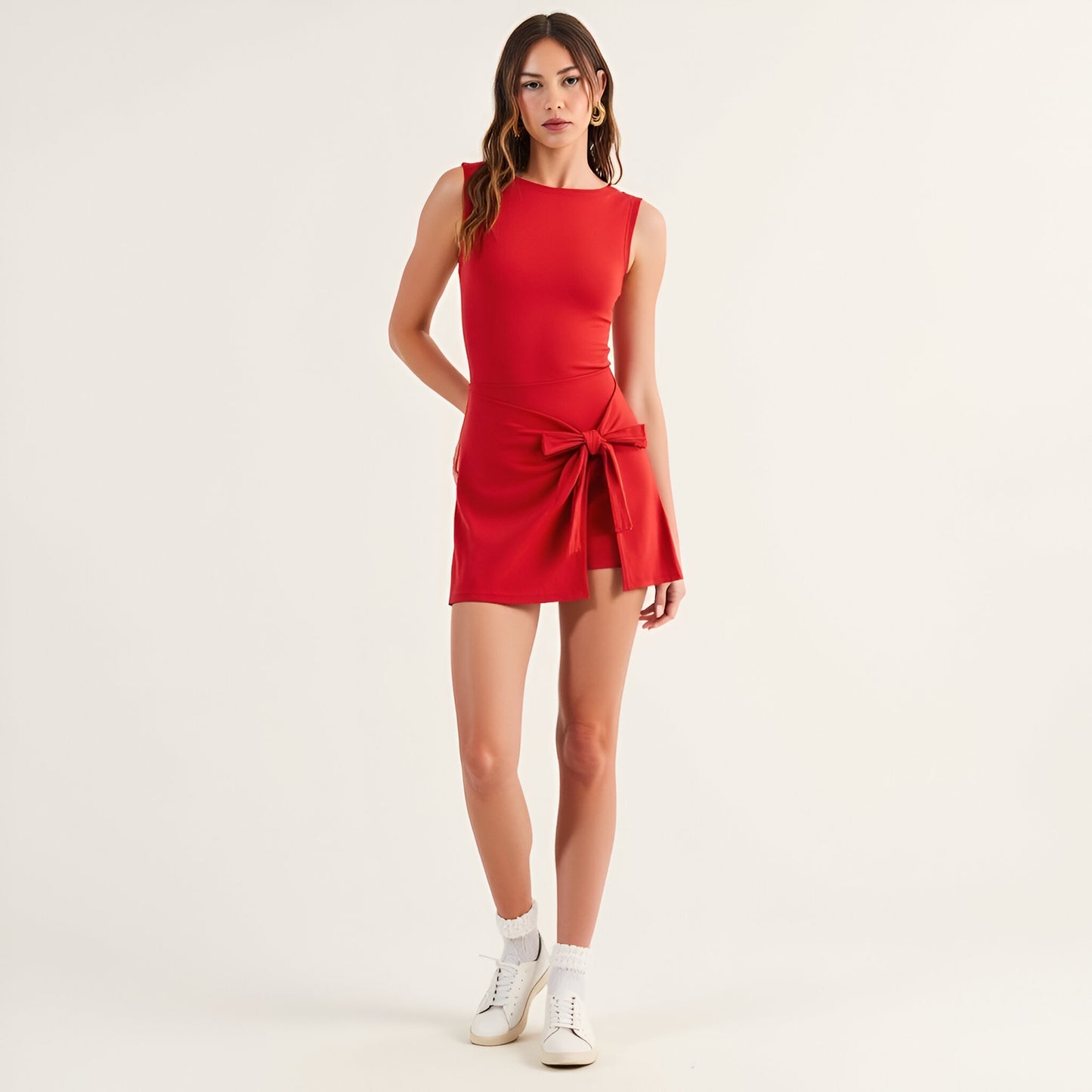 Sleeveless Active Romper with Side Tie Skirt Overlay and Crew Neckline