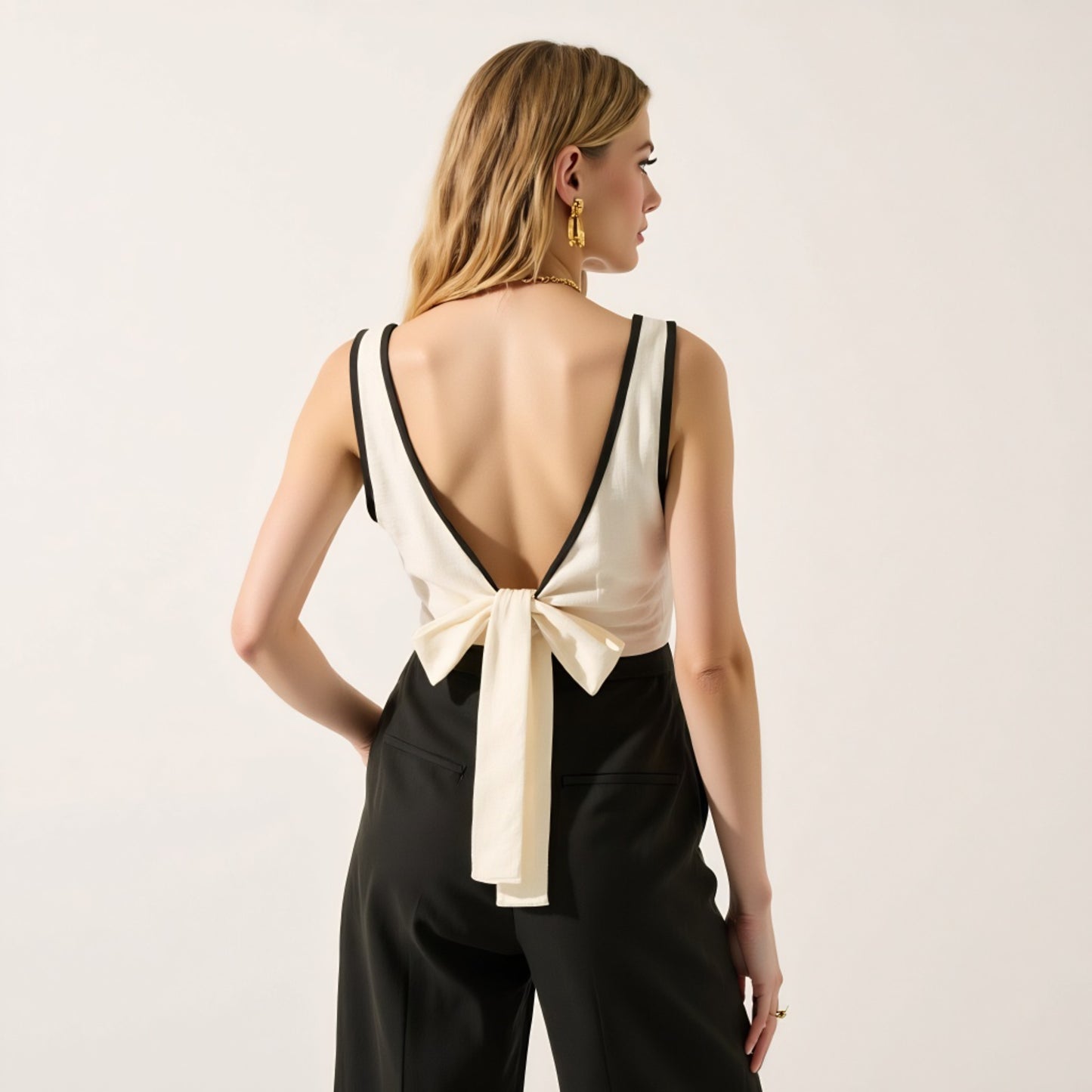 Sleeveless Two-Tone Wide Leg Jumpsuit with Deep V-Neckline