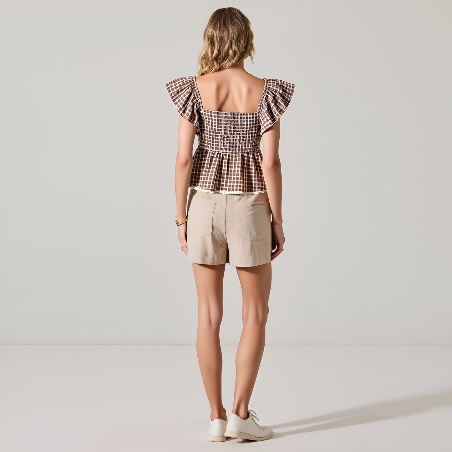 Gingham Peplum Top with Flutter Sleeves and Front Tie Detail