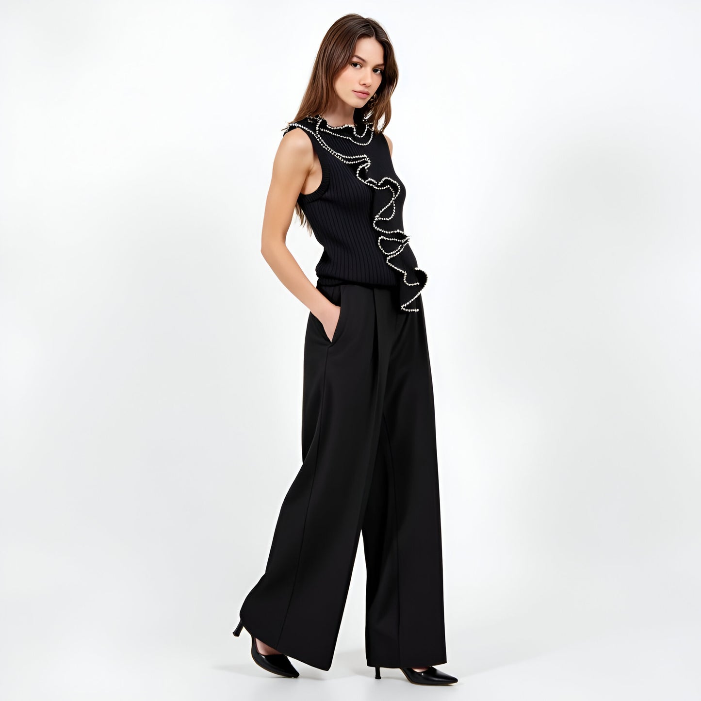 Sleeveless Ribbed Knit Top with Dramatic Pearl-Trimmed Ruffle Detail