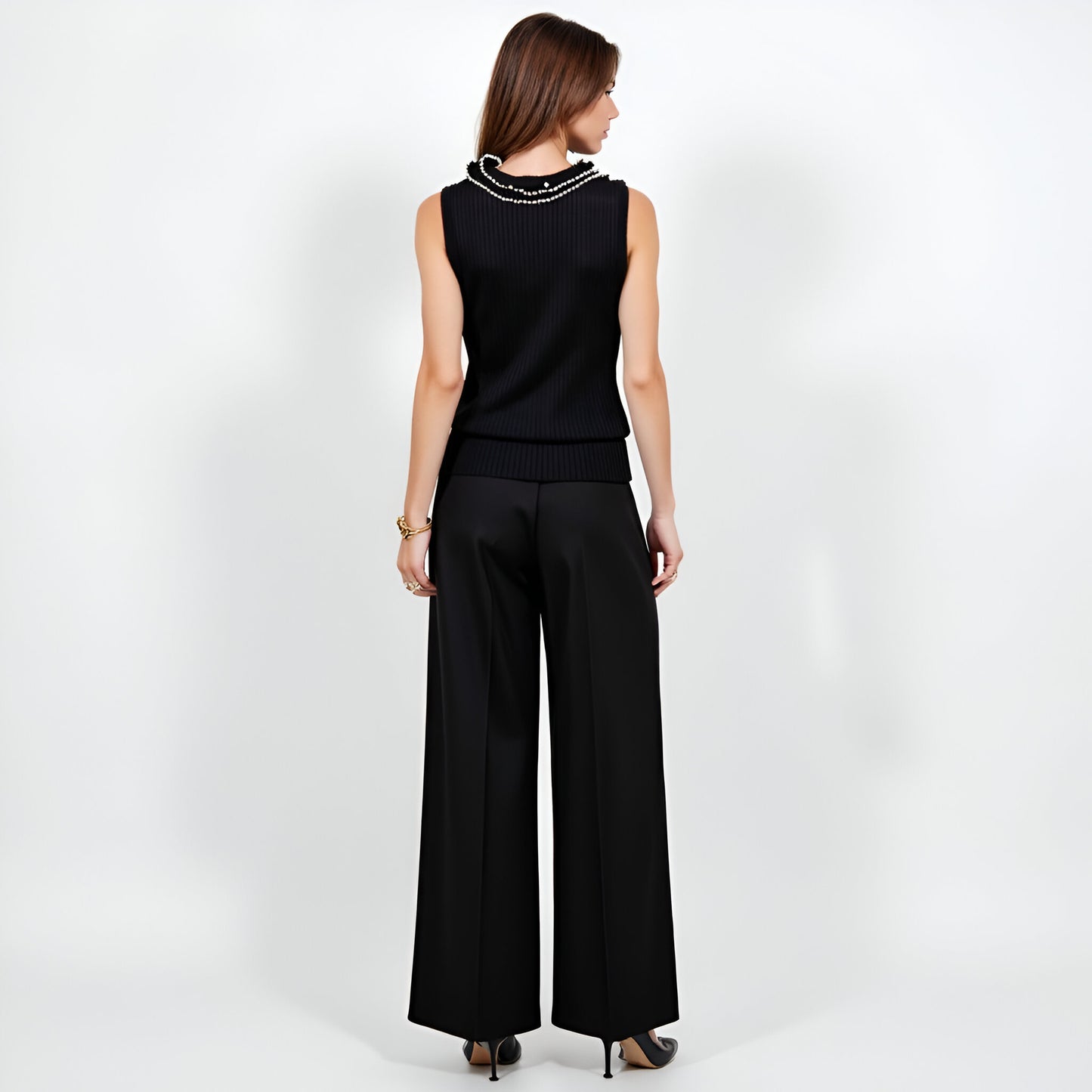 Sleeveless Ribbed Knit Top with Dramatic Pearl-Trimmed Ruffle Detail
