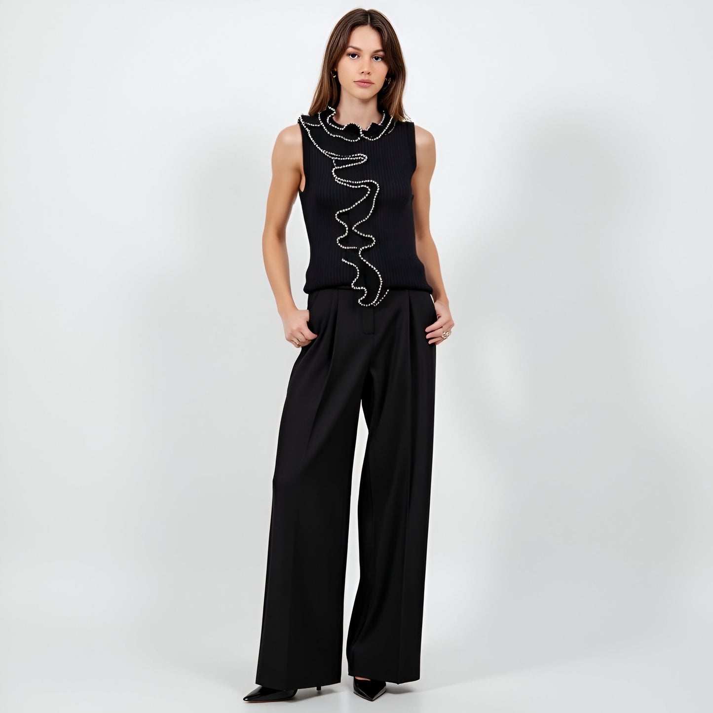 Sleeveless Ribbed Knit Top with Dramatic Pearl-Trimmed Ruffle Detail