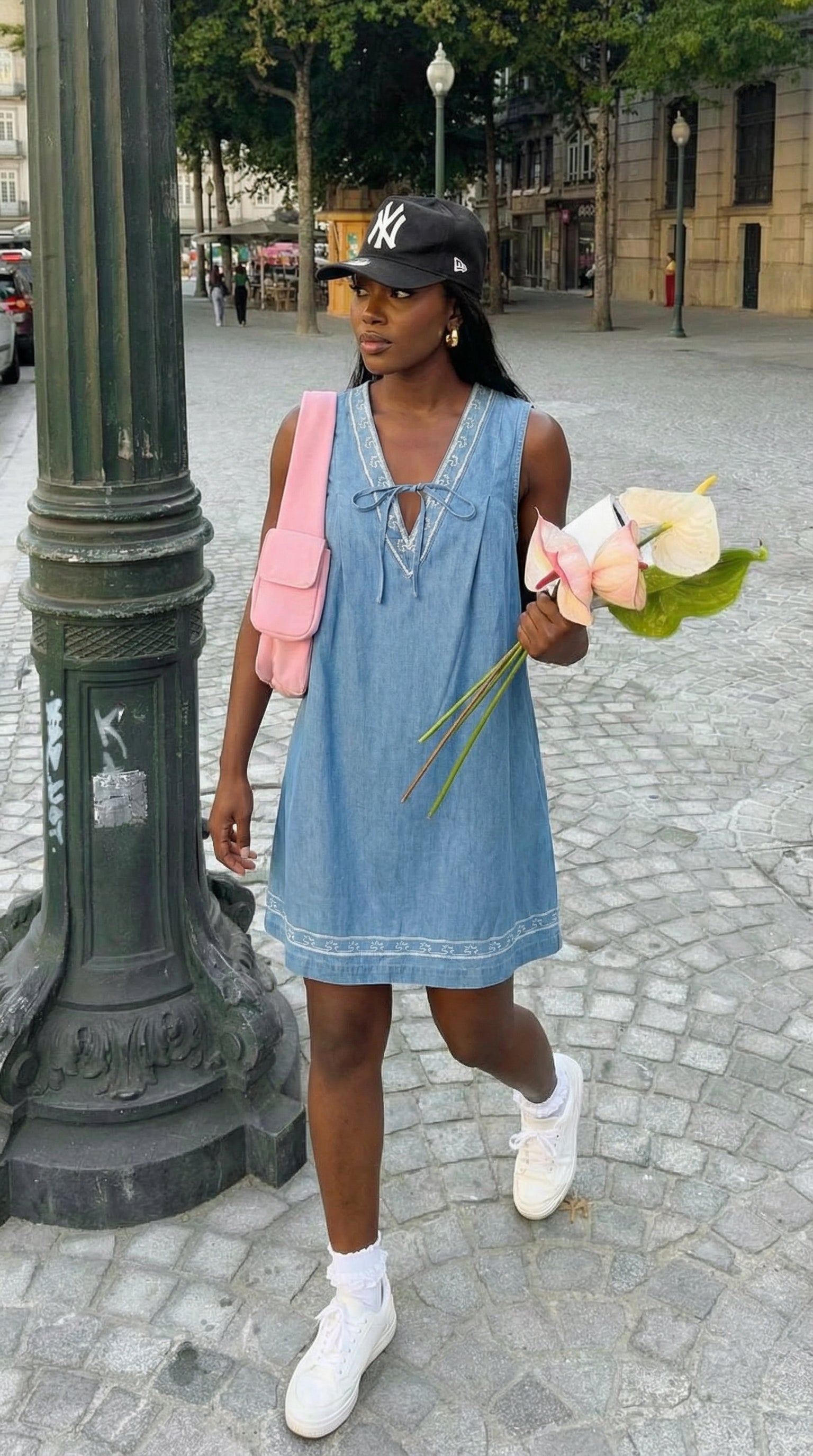 Sleeveless Mini Dress with Embroidered Trim and Tie Front Detail
