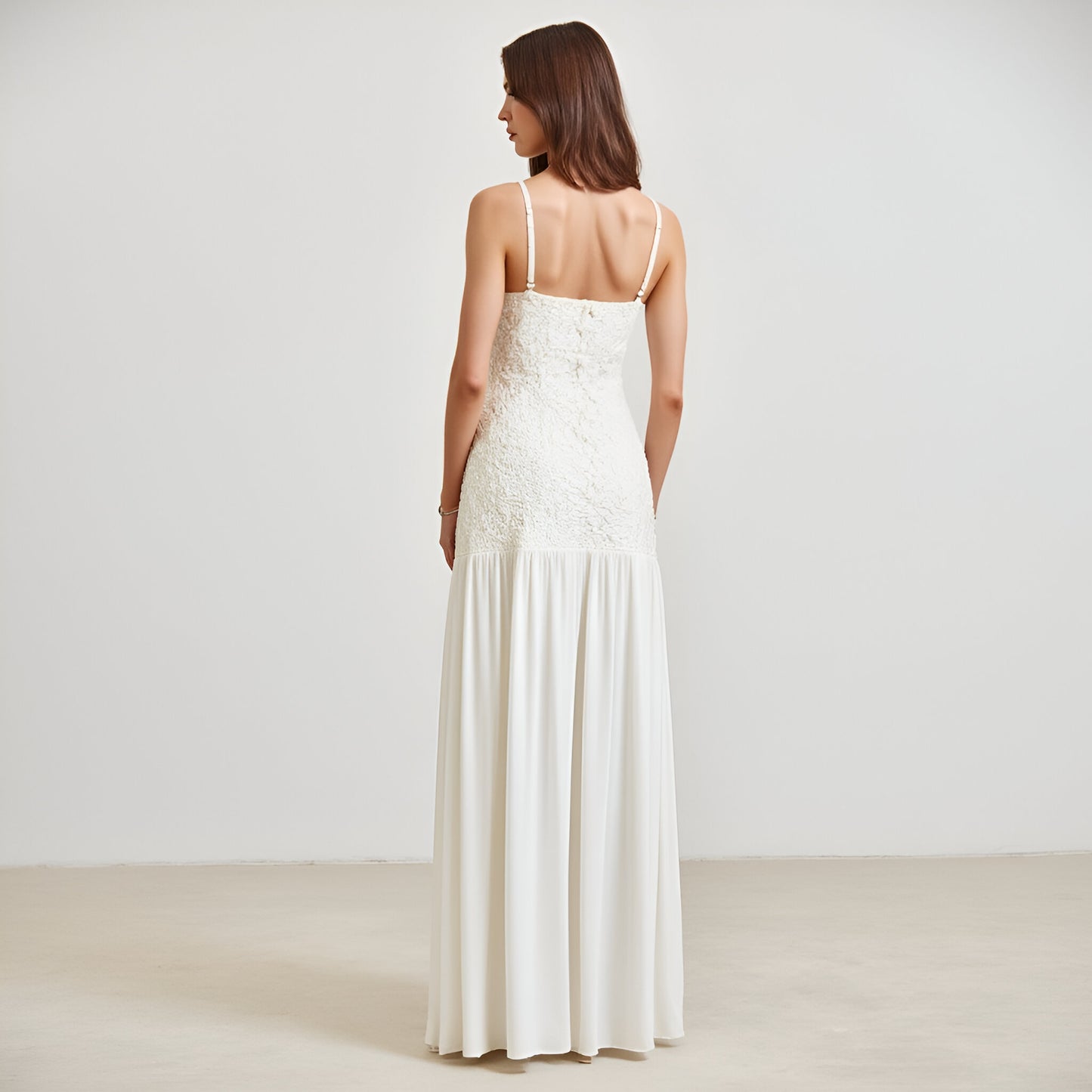 Lace Bodice Gown with Spaghetti Straps and Flowing Pleated Skirt